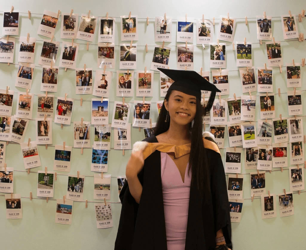 Pauline's graduation photo from Biomedical Sciences at the University of Sheffield, marking the transition from healthcare studies to a career in technology through web development, student vlogging, and community building