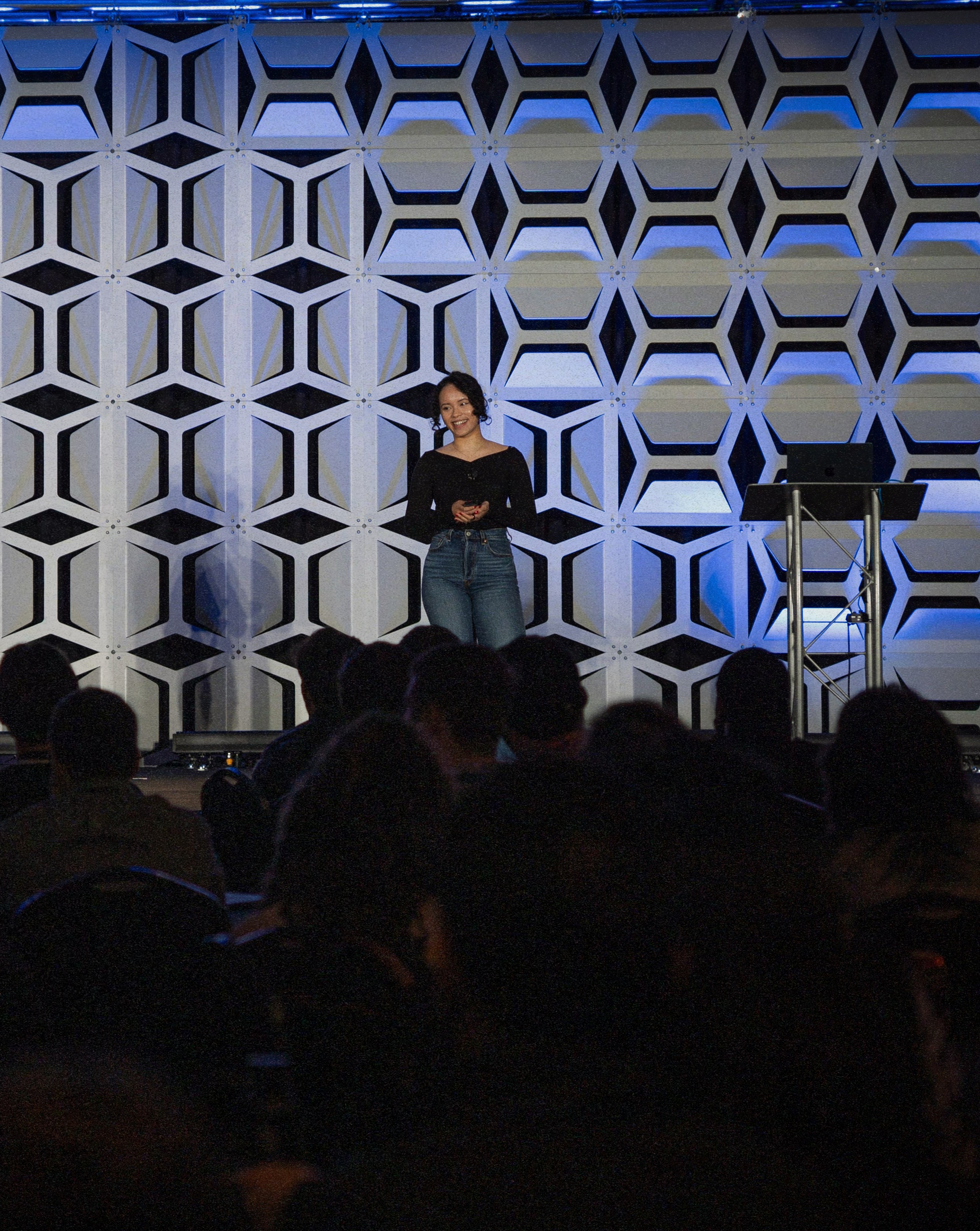 Pauline Narvas speaking at a community event
